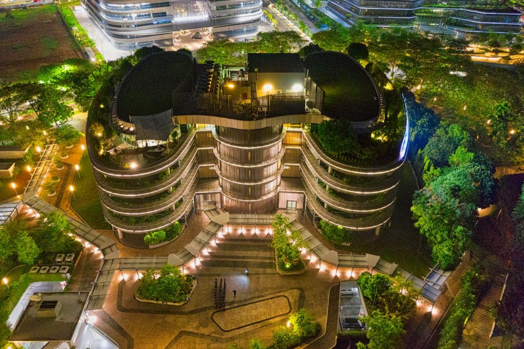 pexels-photo-2344264 A stunning night aerial view of a modern architectural building in Banten, Indonesia, illuminated with vibrant lights.