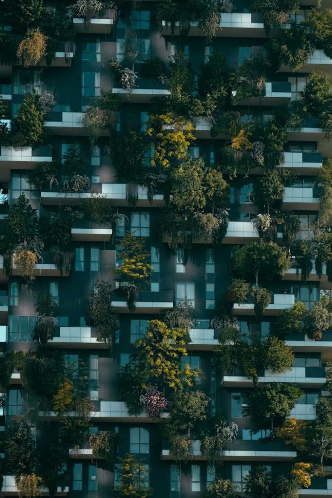 pexels-photo-4322027 Facade of a contemporary building with lush greenery in Milan's Bosco Verticale.